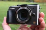 Image result for lumix gx1 in hand